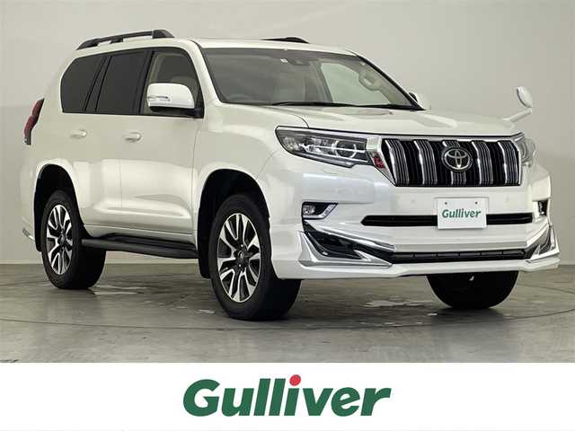 トヨタ ランドクルーザー プラド TX Lパッケージ 滋賀県 2022(令4)年 3.1万km ホワイトパールクリスタルシャイン 禁煙車/純正ナビ/（BT/SD/HDMI/フルセグ）/サンルーフ/エアロ（F・R）/ビルトインETC/前方ドライブレコーダー/運転席・助手席パワーシート/運転席・助手席シートヒーター/運転席・助手席エアーシート/トヨタセーフティセンス/・プリクラッシュセーフティ/・レーンディパーチャーアラート（LDA）/・レーダークルーズコントロール（ブレーキ制御付）/・ロードサインアシスト（RSA）/・オートマチックハイビーム（AHB）/・インテリジェントクリアランスソナー（パーキングサポートブレーキ）/・VSC（車両安定性制御システム）/LEDヘッドライト/フォグランプ/ルーフレール/ウッドパネル