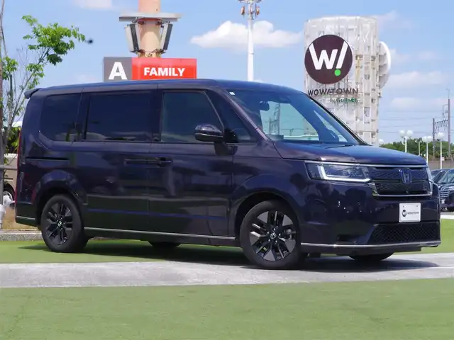 ホンダ ステップワゴン スパーダ eHEV 千葉県 2024(令6)年 1.9万km トワイライトミストブラックパール ホンダセンシング/・衝突軽減ブレーキ（CMBS）/・車線維持支援システム（LKAS）/・アダプティブクルーズコントロール（ACC）/・後方誤発進抑制機能/・誤発進抑制機能/・後方誤発進抑制機能/両側パワースライドドア/ハーフレザーシート/前席シートヒーター/11.4インチ純正コネクトナビ/地デジTV/【DVD/CD再生機能　Bluetooth接続】/マルチビューカメラシステム/ドライブレコーダー（前後撮影）【ZDR-038】/デジタルインナーミラー/パドルシフト/ETC/LEDヘッドライト/フォグライト/ウインカーミラー/コーナーセンサー/純正16インチアルミホイル/サイド/カーテンエアバッグ/Honda スマートキー