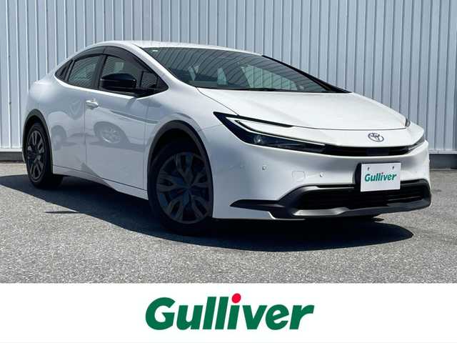 トヨタ プリウス X 滋賀県 2023(令5)年 1.3万km スーパーホワイトⅡ 純正ナビ/(Bluetooth/フルセグ/CD/DVD/AM/FM)/トヨタセーフティーセンス/・プリクラッシュセーフティ/・レーダークルーズコントロール/・標識認識/・オートハイビーム/LEDオートライト/クリアランスソナー/後方車接近告知/ブラインドスポットモニター/電動パーキング/ブレーキホールド/ビルトインETC/ドライブレコーダー/USB/100V電源