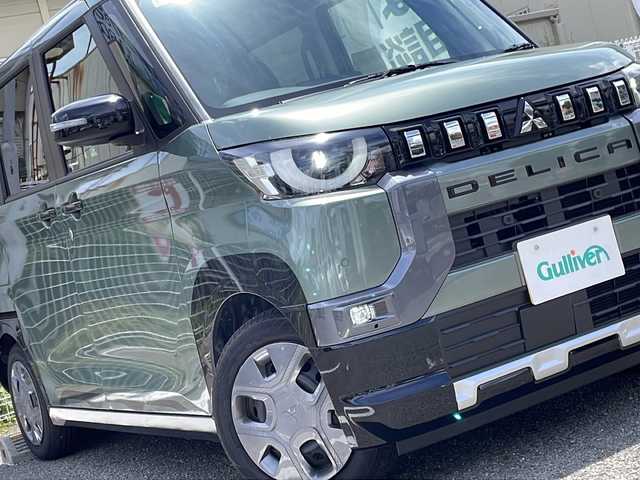 三菱 デリカミニ G 兵庫県 2024(令6)年 0.7万km 緑 登録時走行距離6236km/彩速ナビ/地デジTV/Bluetooth/バックカメラ/パワースライドドア/e-アシスト（運転支援機能）/LEDヘッドランプ/前後ドライブレコーダー/ブラックドアミラー/合皮/ブラック調ファブリック撥水シート/シートヒーター（前席）/スマートキー/エンジンプッシュスタート/ブラックルーフレール/保証書/取説/スペアキー