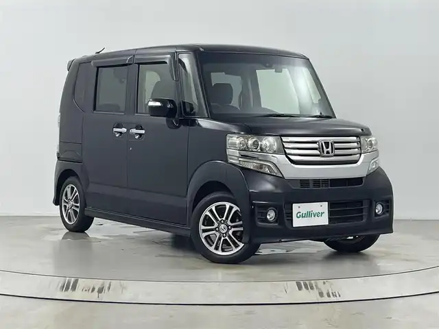 ホンダ Ｎ ＢＯＸ 2トーン カスタム SSパッケージ 埼玉県 2015(平27)年 5.9万km スマートブラック 社外ナビ　/　AM/FM/CD/DVD/BT /バックカメラ　/両側パワースライドドア　/前後ドライブレコーダー　/横滑り防止システム　/ステアリングリモコン/純正アルミホイール　/フロアマット　/フォグランプ　/キセノンヘッドライト/オートライト/ウィンカーミラー/ドアバイザー　/プッシュスタート/スマートキー
