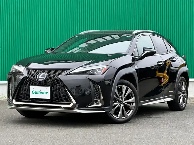 レクサス ＵＸ 250h Fスポーツ 宮城県 2019(平31)年 9.5万km グラファイトブラックガラスフレーク 3眼LEDヘッドランプ/・角型3眼LEDヘッドランプ/・アダプティブハイビームシステム/・ヘッドランプクリーナー/ブラインドスポットモニターセット/・ブラインドスポットモニター/・パーキングサポートブレーキ（後方接近車両）/シルバールーフレール/＝＝＝/Lexus Safety System +/・プリクラッシュセーフティ/・レーントレーシングアシスト/・レーダークルーズコントロール/・先行車発進告知機能/・ロードサインアシスト/パーキングサポートブレーキ（静止物）/純正SDナビ/【CD・DVD・SD・BT・USB・フルセグTV】/バックカメラ/純正ドライブレコーダー/パワーバックドア/ETC/L-tex（合皮）シート/シートヒーター・エアシート/パワーシート/ハンドルヒーター/ステアリングスイッチ/パドルシフト/LEDヘッドライト/LEDフォグ/オートライト/スマートキーX２/カードキー/純正18インチAW/W/サイド/カーテンエアバッグ