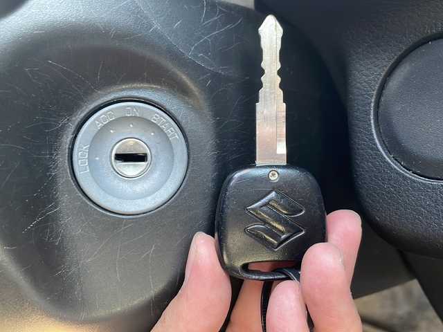 スズキ アルト L 山口県 2016(平28)年 7.2万km スペリアホワイト 純正CDチューナー/　AM/FM/AUX/リモコンキー/前席シートヒーター/アイドリングストップ/横滑り防止装置/ヘッドライトレベライザー/マニュアルエアコン/エネチャージ/純正ホイールキャップ/保証書・取説/スペアキー1本