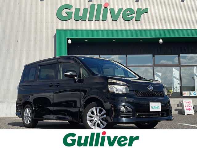 トヨタ ヴォクシー ZS 島根県 2013(平25)年 6.7万km ブラック ALPINE8インチSDナビゲーション(VIE-X008)/フルセグ BT SD CD DVD/バックカメラ/パドルシフト/パワーバックドア/両側パワースライドドア/ビルトインETC/HIDヘッドライト/フォグライト