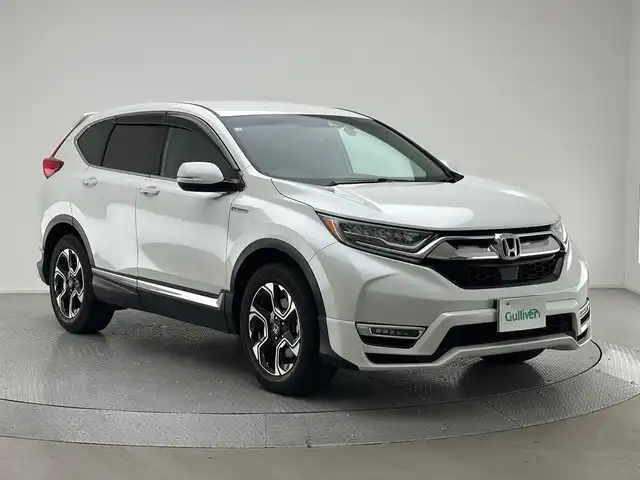 ホンダ ＣＲ－Ｖ ハイブリッド EX 兵庫県 2018(平30)年 4.4万km プラチナホワイトパール 純正SDナビ/（CD/DVD/SD/Bluetooth/フルセグTV）/・vru-195cvi/バックカメラ/ホンダセンシング/ブラインドスポットモニター/アダクティブクルーズコントロール/レーンキープアシスト/プリクラッシュセーフティー/横滑り防止装置/盗難防止装置/カーテンエアバッグ/シートヒーター（D/N席）/D席パワーシート/パドルシフト/ビルトインETC2.0/MTモード付AT/LEDヘッドライト/LEDフォグランプ/オートライト/前方ドライブレコーダー/純正18インチアルミホイール/純正フロアマット/ドアバイザー/スマートキー/スペアキー1本