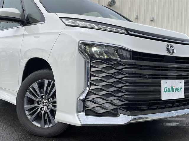 トヨタ ヴォクシー S－Z 道北・旭川 2024(令6)年 2.5万km ホワイトパールクリスタルシャイン /4WD//禁煙車//寒冷地仕様//純正ディスプレイオーディオプラス/BT/USB/CD/DVD/フルセグ/Miracat//LDA/PCS/PDA/クリアランスソナー/PKSB/RSA/ACC/PSD/発進遅れ告知/後退速度抑制//両側パワースライドドア//前席シートヒーター//ハーフレザーシート//革巻きステアリング//ステアリングスィッチ//革巻きステアリング//オートライト//LEDヘッドライト//オートマチックハイビーム//フロントデアイサー//ETC//社外フロアマット//ヘットライトレベライザー//オートリトラミラー//サンシェード//保証書//取扱説明書