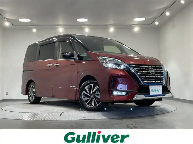 日産 セレナ e－パワー ハイウェイスター V 愛知県 2022(令4)年 1.3万km マルーンレッド 2トーン 純正１０インチナビ/（フルセグTV/CD/DVD/ブルーレイ/Bluetooth）/純正１１インチフリップダウンモニター/プロパイロット/アラウンドビューモニター/両側電動スライドドア/衝突軽減ブレーキ/デジタルインナーミラー/シートヒーター/ビルトインＥＴＣ/LEDヘッドライト/純正ドライブレコーダー