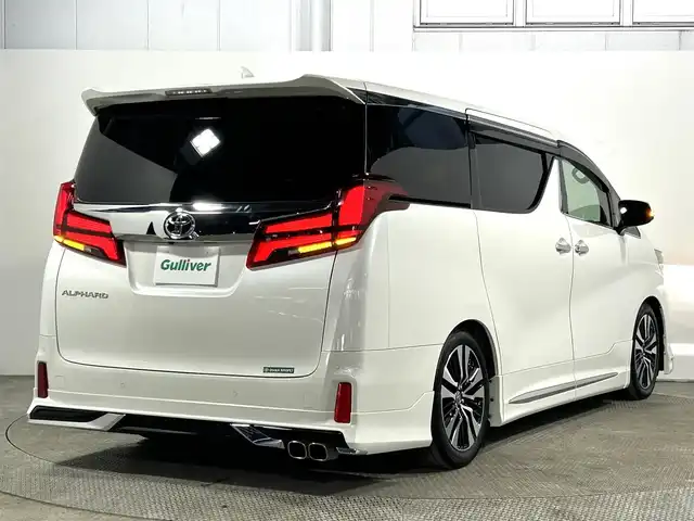 トヨタ アルファード S Cパッケージ 大阪府 2023(令5)年 1.9万km ホワイトパールクリスタルシャイン サンルーフ　黒革シート　モデリスタエアロ／マフラー　後席モニター　三眼ＬＥＤ　デジタルインナーミラー　純正ナビＴＶ　パワーシート／ヒーター／エアコン　電動リアゲート　ＢＳＭ　衝突軽減　レーダーＣ