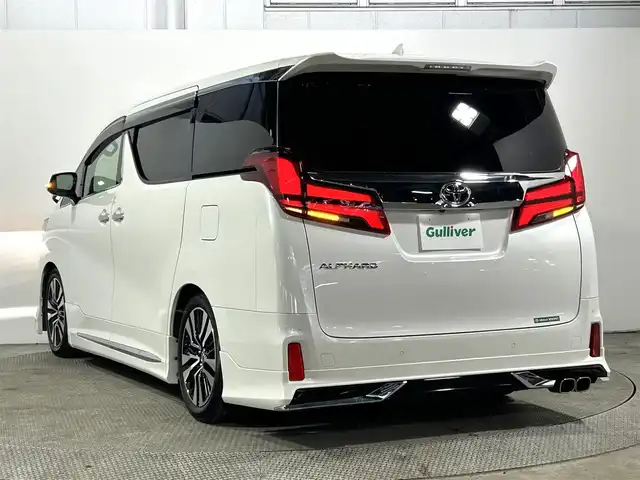 トヨタ アルファード S Cパッケージ 大阪府 2023(令5)年 1.9万km ホワイトパールクリスタルシャイン サンルーフ　黒革シート　モデリスタエアロ／マフラー　後席モニター　三眼ＬＥＤ　デジタルインナーミラー　純正ナビＴＶ　パワーシート／ヒーター／エアコン　電動リアゲート　ＢＳＭ　衝突軽減　レーダーＣ