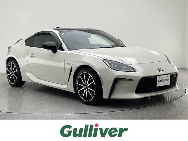 トヨタ ＧＲ８６ SZ 兵庫県 2023(令5)年 1.6万km パール 社外メモリナビ（ケンウッド　MDV-M908HDL）/（CD、DVD、SD、BT、フルセグ）/HDMI/カロッツェリアツイーター/アルパインミラー型ドライブレコーダー/バックカメラ/ETC/パドルシフト/クリアランスソナー/ACC/PCS/LDW/RAB/MAIN　FACTORYマフラー/LEDヘッドライト/社外シートカバー/社外マット/純正フロアマット積載/社外バイザー/純正15インチAW/スペアキー×１