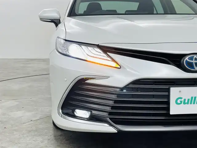 トヨタ カムリ G 福島県 2021(令3)年 4.2万km プラチナホワイトパールマイカ トヨタセーフティセンス/・プリクラッシュセーフティ/・レーントレーシングアシスト/・先行車発進告知機能/・ブラインドスポットモニター/純正9インチディスプレイオーディオ/・6スピーカー/・DVD/CD/BT/USB/AM/FM/バックカメラ/オートクルーズコントロール/LEDオートライト/・フォグランプ/・オートハイビーム/パワーシート/純正17インチアルミホイール付きサマータイヤ/MTモード付AT/充電用USB端子/純正フロアマット/電動格納ミラー/電子パーキング/・オートホールド/プッシュスタート/・スマートキー