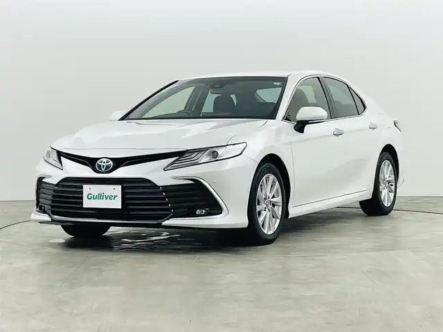トヨタ カムリ G 福島県 2021(令3)年 4.2万km プラチナホワイトパールマイカ トヨタセーフティセンス/・プリクラッシュセーフティ/・レーントレーシングアシスト/・先行車発進告知機能/・ブラインドスポットモニター/純正9インチディスプレイオーディオ/・6スピーカー/・DVD/CD/BT/USB/AM/FM/バックカメラ/オートクルーズコントロール/LEDオートライト/・フォグランプ/・オートハイビーム/パワーシート/純正17インチアルミホイール付きサマータイヤ/MTモード付AT/充電用USB端子/純正フロアマット/電動格納ミラー/電子パーキング/・オートホールド/プッシュスタート/・スマートキー