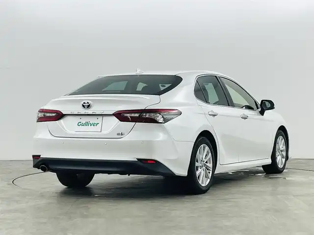 トヨタ カムリ G 福島県 2021(令3)年 4.2万km プラチナホワイトパールマイカ トヨタセーフティセンス/・プリクラッシュセーフティ/・レーントレーシングアシスト/・先行車発進告知機能/・ブラインドスポットモニター/純正9インチディスプレイオーディオ/・6スピーカー/・DVD/CD/BT/USB/AM/FM/バックカメラ/オートクルーズコントロール/LEDオートライト/・フォグランプ/・オートハイビーム/パワーシート/純正17インチアルミホイール付きサマータイヤ/MTモード付AT/充電用USB端子/純正フロアマット/電動格納ミラー/電子パーキング/・オートホールド/プッシュスタート/・スマートキー