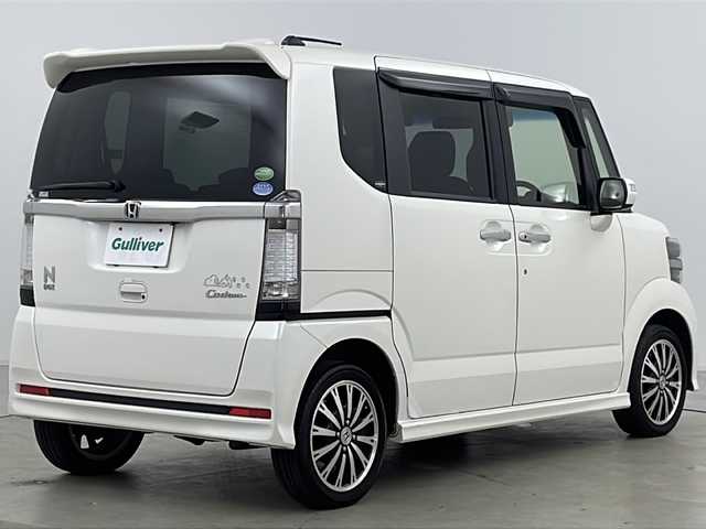 ホンダ Ｎ ＢＯＸ カスタム G ターボSSパッケージ 道央・札幌 2015(平27)年 8.1万km プレミアムホワイトパール ・4WD/・ワンオーナー/・Gathers純正ナビ&フルセグ&CD&DVD&BT&SD&USB&iPod/・バックカメラ/・両側パワースライドドア/・シティブレーキアクティブシステム/・シートヒーター/・社外AW付スタッドレス/・革巻きステアリング/・ステアリングスイッチ/・オートライト/・キセノンヘッドライト/・フォグランプ/・ウィンカーミラー/・スマートキー/・スペアキー/・プッシュスタート/・横滑り防止/・ECON