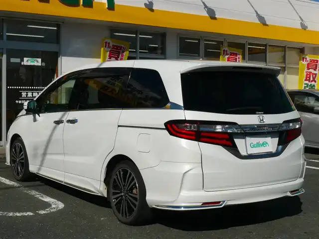ホンダ オデッセイ アブソルート EX ADV 静岡県 2015(平27)年 6.4万km ホワイトオーキッドパール ワンオーナー/禁煙車/純正インターナビ/フリップダウンモニター/全周囲カメラ/フルセグテレビ/Bluetooth/DVD再生/USB/HDMI/ホンダセンシング/・衝突軽減ブレーキ/・ブラインドスポット/・先行車発進お知らせ/・路外逸脱抑制システム/・標識認識機能/・レーダークルーズ/オートライト/LEDヘッドライト/スマートキー/ETC/新車保証書/取扱説明書