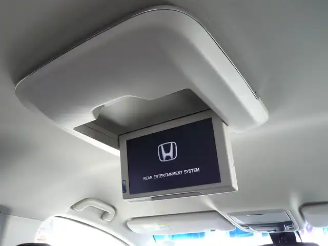 ホンダ オデッセイ アブソルート EX ADV 静岡県 2015(平27)年 6.4万km ホワイトオーキッドパール ワンオーナー/禁煙車/純正インターナビ/フリップダウンモニター/全周囲カメラ/フルセグテレビ/Bluetooth/DVD再生/USB/HDMI/ホンダセンシング/・衝突軽減ブレーキ/・ブラインドスポット/・先行車発進お知らせ/・路外逸脱抑制システム/・標識認識機能/・レーダークルーズ/オートライト/LEDヘッドライト/スマートキー/ETC/新車保証書/取扱説明書