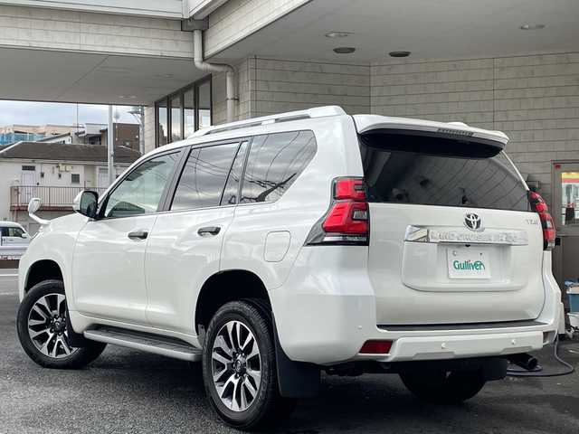 トヨタ ランドクルーザー プラド TZ－G 神奈川県 2023(令5)年 1.1万km ホワイトパールクリスタルシャイン ワンオーナー/社外アルパインナビ/（CD/DVD/AM/FM/USB/SD/BT/フルセグTV)/Apple Car Play/Android Auto/バックカメラ/前後ドライブレコーダー/ETC/パドルシフト/レーダークルーズコントロール/サイドアンダーミラー/革シート/D席メモリシート/D/N席パワーシート/D/N席エアーシート/D/N席シートヒーター/レーンキープアシスト/プリクラッシュ/前後クリアランスソナー/盗難防止装置/ダウンヒルアシストコントロール/横滑り防止装置/純正フロアマット/純正アルミホイール/電動チルト/両側サイドステップ/ルーフレール/オートライト/オートハイビーム/フォグランプ/ISOFIX/スペアキー×１/保証書/取扱説明書