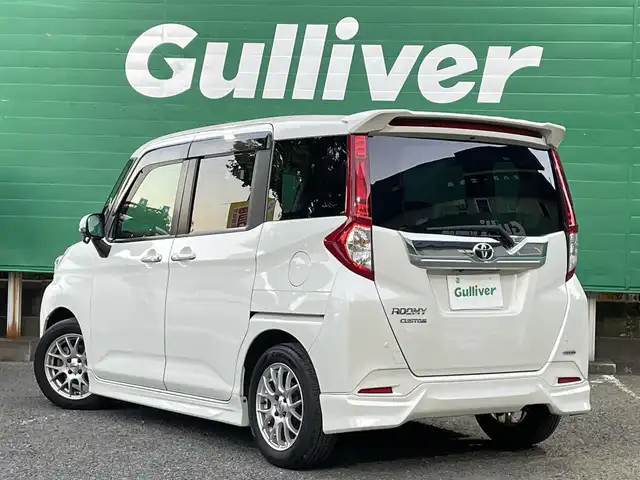 トヨタ ルーミー カスタムG－T 東京都 2017(平29)年 4.9万km パールホワイトⅢ コンフォートパッケージ/・前席シートヒーター/・前席シートバックテーブル/ナビレディパッケージ/・バックカメラ/・ステアリングスイッチ(オーディオ)/モデリスタエアロ　フロント/リアスカート/リアスポイラー/9型メモリナビ(ALPINE　X9V)/社外アンプ　(ALPINE　3553)/ターボ車/クルーズコントロール/スマートアシスト2(衝突回避支援システム)/・衝突回避支援ブレーキ機能/・衝突警報機能/・車線逸脱警報機能/・誤発進抑制制御機能/・先行者発進お知らせ機能/前後方ドライブレコーダー(ZDR015)/両側パワースライドドア/LEDヘッドライト/マルチインフォメーションディスプレイ/スペアキー×1/保証書/取扱説明書
