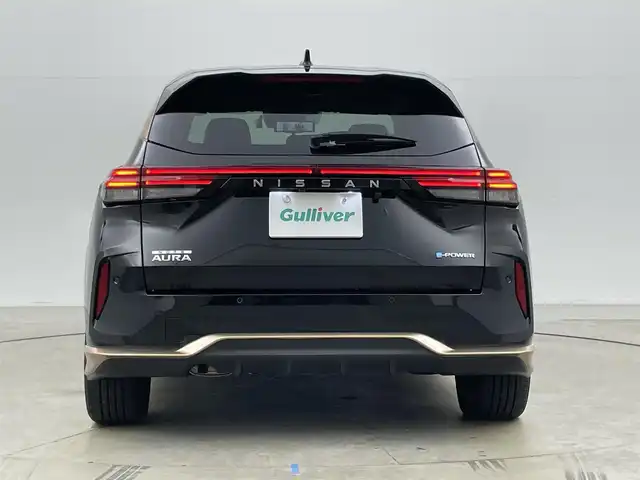 日産 オーラ G レザーエディション 岡山県 2022(令4)年 2.7万km ミッドナイトブラック/サンライズカッパー 純正９インチナビ/【Bluetooth/フルセグTV/Carplay/USB】/ＢＯＳＥプレミアムサウンド/アラウンドビューモニター/デジタルインナーミラー/プロパイロット/前席シートヒーター/ステアリングヒーター/純正ドライブレコーダー（前）/ビルトインＥＴＣ２．０/ＬＥＤヘッドライト/オートハイビーム/フォグランプ/ワイヤレス充電/ＴＶキャンセラー/純正17インチアルミホイール/レザーシート