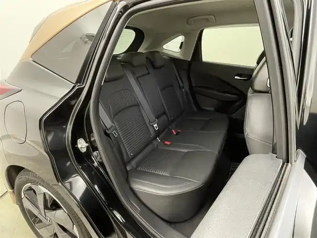 日産 オーラ G レザーエディション 岡山県 2022(令4)年 2.7万km ミッドナイトブラック/サンライズカッパー 純正９インチナビ/【Bluetooth/フルセグTV/Carplay/USB】/ＢＯＳＥプレミアムサウンド/アラウンドビューモニター/デジタルインナーミラー/プロパイロット/前席シートヒーター/ステアリングヒーター/純正ドライブレコーダー（前）/ビルトインＥＴＣ２．０/ＬＥＤヘッドライト/オートハイビーム/フォグランプ/ワイヤレス充電/ＴＶキャンセラー/純正17インチアルミホイール/レザーシート