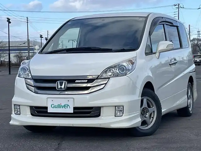 ホンダ ステップワゴン スパーダ S Z HDDナビ 道央・札幌 2008(平20)年 14.7万km プレミアムホワイトパール ４WD/純正ディーラーOPナビ/AM/FM/ワンセグ/バックカメラ/ECONモード/片側パワースライドドア/ステアリングリモコン/リモコンキー/HIDヘッドライト/フォグランプ/電動格納ミラー/ヒーテッドドアミラー/ウィンカーミラー/純正フロアマット/ドアバイザー/スペアキー/純正エンジンスターター