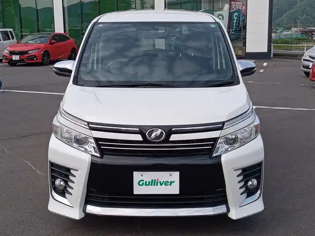 トヨタ ヴォクシー ZS 煌 福井県 2015(平27)年 11万km ホワイトパールクリスタルシャイン 9インチナビ（ALPINE X9）/・（フルセグTV/CD/DVD/Bluetooth）/バックカメラ/ドライブレコーダー/ビルトインETC/ステアリングスイッチ/オートLEDライト/電動格納ウィンカーミラー/両側パワースライドドア/純正16インチAW/スマートキー