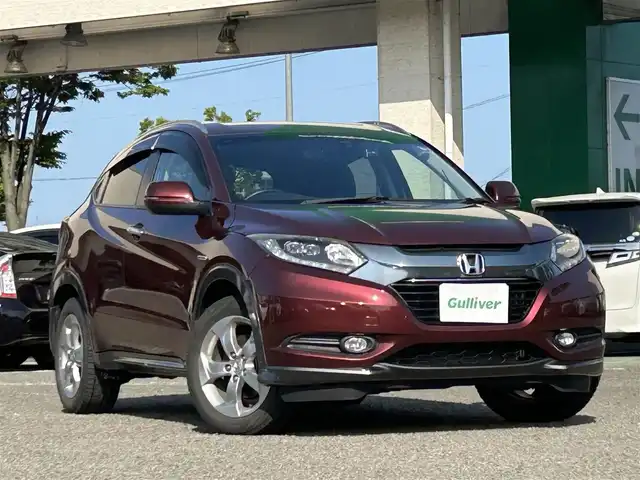 ホンダ ヴェゼル ハイブリッド X Lパッケージ 宮城県 2014(平26)年 10.4万km プレミアムディープロッソパール １オーナー//ドラレコ前後//純正メモリナビ（ワンセグＴＶ，ＡＭ，ＦＭ，ＣＤ，ＢＴ）//クルーズコントロール//エンジンスターター//ＥＴＣ//横滑り防止機能//パドルシフト//ワイパーデアイサー//バックカメラ//ルーフレール//純正フロアマット//USBポートｘ２//HDMIポート//車両接近通報一時停止スイッチ