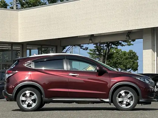 ホンダ ヴェゼル ハイブリッド X Lパッケージ 宮城県 2014(平26)年 10.4万km プレミアムディープロッソパール １オーナー//ドラレコ前後//純正メモリナビ（ワンセグＴＶ，ＡＭ，ＦＭ，ＣＤ，ＢＴ）//クルーズコントロール//エンジンスターター//ＥＴＣ//横滑り防止機能//パドルシフト//ワイパーデアイサー//バックカメラ//ルーフレール//純正フロアマット//USBポートｘ２//HDMIポート//車両接近通報一時停止スイッチ