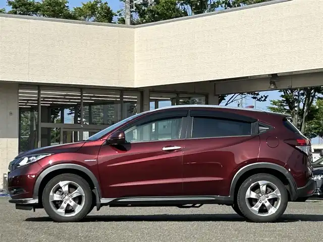 ホンダ ヴェゼル ハイブリッド X Lパッケージ 宮城県 2014(平26)年 10.4万km プレミアムディープロッソパール １オーナー//ドラレコ前後//純正メモリナビ（ワンセグＴＶ，ＡＭ，ＦＭ，ＣＤ，ＢＴ）//クルーズコントロール//エンジンスターター//ＥＴＣ//横滑り防止機能//パドルシフト//ワイパーデアイサー//バックカメラ//ルーフレール//純正フロアマット//USBポートｘ２//HDMIポート//車両接近通報一時停止スイッチ