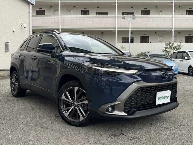 トヨタ カローラ クロス ハイブリッド Z 兵庫県 2024(令6)年 0.7万km マッシブグレー ワンオーナー/純正ディスプレイオーディオ/　Bluetooth/AM/FM/フルセグテレビ/バックカメラ/純正ビルトインETC/パワーシート（D席）/シートヒーター（D+N席）/パワーバックドア/ステアリングスイッチ/アイドリングストップ/レーダークルーズコントロール/アンチロック・ブレーキ・システム/レーンキープアシスト/前後コーナーセンサー/横滑り防止装置/衝突被害軽減システム/純正フロアマット/純正アルミホイール（R18）/パワーステアリング/パワーウィンドウ/エアバッグ（）/カーテンエアバッグ/LEDヘッドライト/オートマチックハイビーム/スマートキー/スペアキー（1本）/保証書/取扱説明書