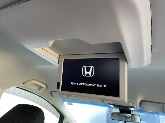 ホンダ オデッセイ ハイブリッド アブソルートセンシングEXパック 東京都 2016(平28)年 6万km プレミアムヴィーナスブラックP 純正ナビ/純正フリップダウンモニター/FM/AM/DVD/CD/マルチビューカメラシステム/フルセグTV/ETC/衝突軽減ブレーキ装置/両側電動スライドドア/ハーフレザー/レーンアシスト/LEDヘッドライト