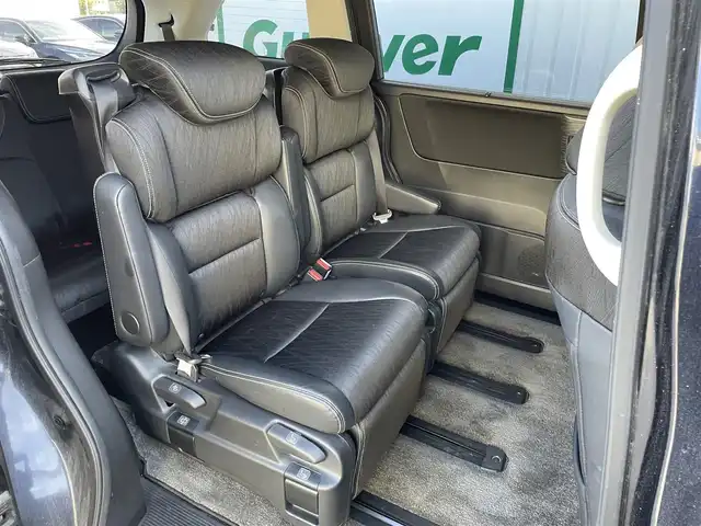 ホンダ オデッセイ ハイブリッド アブソルートセンシングEXパック 東京都 2016(平28)年 6万km プレミアムヴィーナスブラックP 純正ナビ/純正フリップダウンモニター/FM/AM/DVD/CD/マルチビューカメラシステム/フルセグTV/ETC/衝突軽減ブレーキ装置/両側電動スライドドア/ハーフレザー/レーンアシスト/LEDヘッドライト