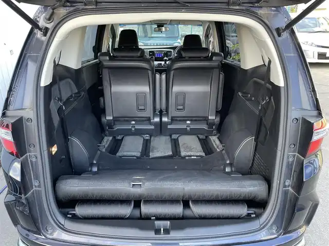 ホンダ オデッセイ ハイブリッド アブソルートセンシングEXパック 東京都 2016(平28)年 6万km プレミアムヴィーナスブラックP 純正ナビ/純正フリップダウンモニター/FM/AM/DVD/CD/マルチビューカメラシステム/フルセグTV/ETC/衝突軽減ブレーキ装置/両側電動スライドドア/ハーフレザー/レーンアシスト/LEDヘッドライト