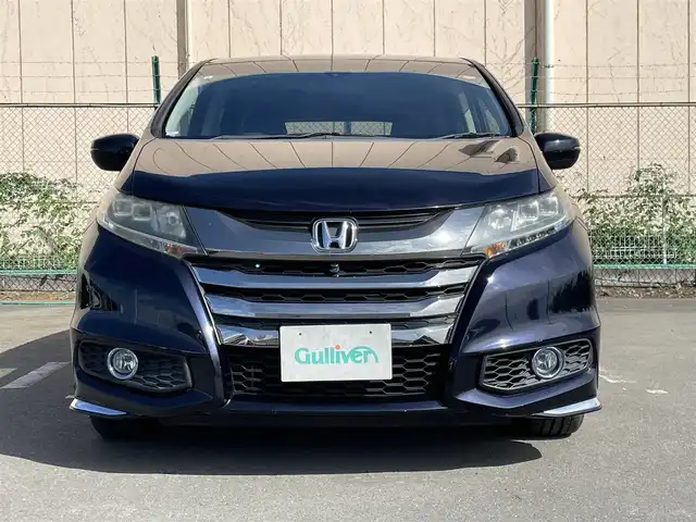 ホンダ オデッセイ ハイブリッド アブソルートセンシングEXパック 東京都 2016(平28)年 6万km プレミアムヴィーナスブラックP 純正ナビ/純正フリップダウンモニター/FM/AM/DVD/CD/マルチビューカメラシステム/フルセグTV/ETC/衝突軽減ブレーキ装置/両側電動スライドドア/ハーフレザー/レーンアシスト/LEDヘッドライト