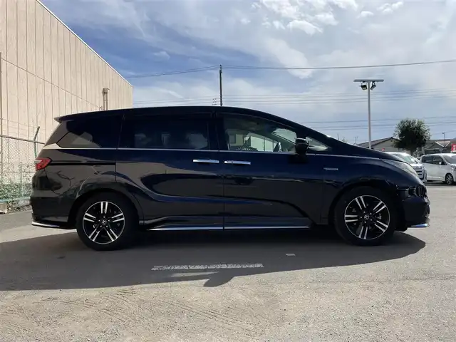 ホンダ オデッセイ ハイブリッド アブソルートセンシングEXパック 東京都 2016(平28)年 6万km プレミアムヴィーナスブラックP 純正ナビ/純正フリップダウンモニター/FM/AM/DVD/CD/マルチビューカメラシステム/フルセグTV/ETC/衝突軽減ブレーキ装置/両側電動スライドドア/ハーフレザー/レーンアシスト/LEDヘッドライト