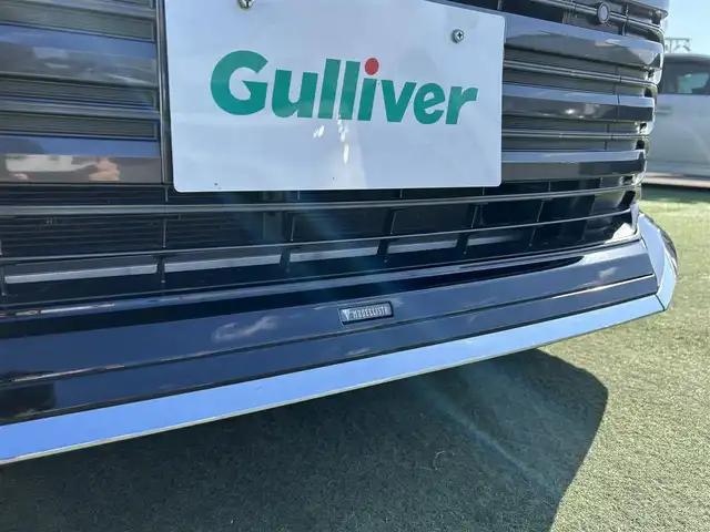 トヨタ ヴォクシー ハイブリッド S－Z 香川県 2022(令4)年 2.1万km アティチュードブラックマイカ モデリスタエアロ/純正１０．５型ＴＶ、ナビ付ＤＡ/バックカメラ/純正１４型EL有機後席モニター/トヨタセーフティセンス/・プリクラッシュセーフティ (PCS)/・レーントレーシングアシスト (LTA)/・レーダークルーズコントロール (ACC)/・オートマチックハイビーム (AHB)/・プロアクティブドライビングアシスト (PDA)/・発進遅れ告知機能/前後ドライブレコーダー/ビルトインＥＴＣ２．０/ハーフレザーシート/シートヒーター/スマートキー/スペアキー/純正17インチAW/純正フロアマット