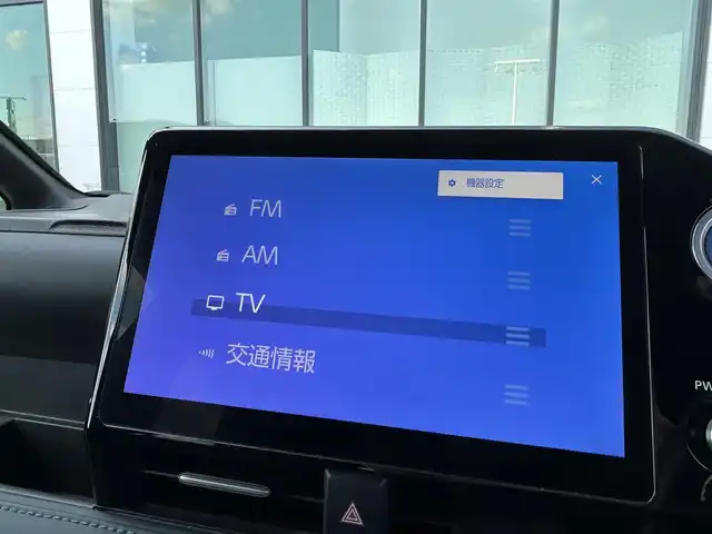 トヨタ ヴォクシー ハイブリッド S－Z 香川県 2022(令4)年 2.1万km アティチュードブラックマイカ モデリスタエアロ/純正１０．５型ＴＶ、ナビ付ＤＡ/バックカメラ/純正１４型EL有機後席モニター/トヨタセーフティセンス/・プリクラッシュセーフティ (PCS)/・レーントレーシングアシスト (LTA)/・レーダークルーズコントロール (ACC)/・オートマチックハイビーム (AHB)/・プロアクティブドライビングアシスト (PDA)/・発進遅れ告知機能/前後ドライブレコーダー/ビルトインＥＴＣ２．０/ハーフレザーシート/シートヒーター/スマートキー/スペアキー/純正17インチAW/純正フロアマット