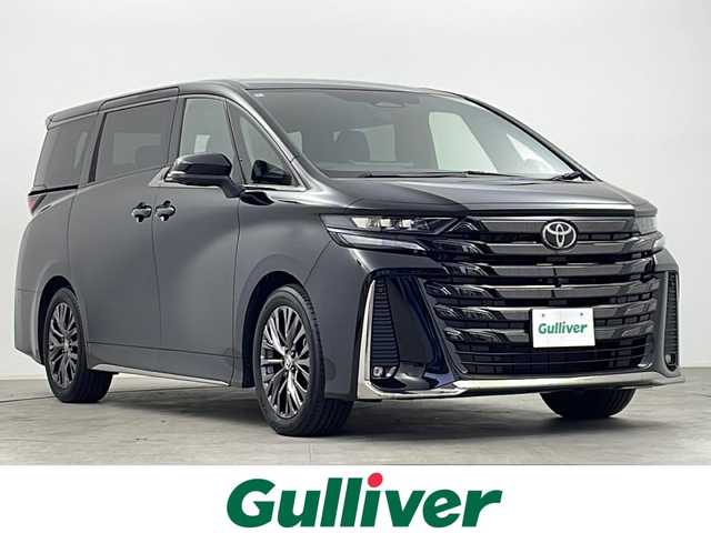 トヨタ ヴェルファイア ハイブリット Z プレミア 千葉県 2024(令6)年 1.1万km ブラック 禁煙車/両側電動ドア/パワーバックドア/ツインガラスルーフ/13.2インチ有機ELフリップダウンモニター/・デジタルインナーミラー/トヨタセーフティセンス/・プリクラッシュセーフティ/・プリクラッシュセーフティブレーキ/・レーンキープアシスト/・ブラインドスポットモニター/・クリアランスソナー/・レーダークルーズコントロール/純正14インチディスプレイオーディオ/・Bluetooth/HDMI/フルセグTV/・パノラミックビューモニター/・ビルトインETC2.0/レザーシート/・D席メモリ付き/・パワーシート（DNセカンドシート）/・シートヒーター（DNセカンドシート）/・エアーシート（DNセカンドシート）/革巻きステアリング/・ステアリングスイッチ/・ステアリングヒーター/・パドルシフト/・パーキングアシスト/電子パーキング/・ブレーキホールド/AC電源/置くだけ充電/電動格納サイドシェード/左右独立エアコン/純正フロアマット/純正19インチAW/オートライト/・オートマチックハイビーム/・三眼LEDヘッドライト/・LEDフォグランプ/・シーケンシャルウインカー
