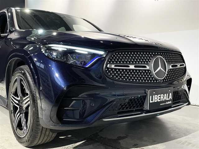 メルセデス・ベンツ Ｍ・ベンツ ＧＬＣ２２０ d 4マチック クーペ 道央・札幌 2023(令5)年 2.4万km 青 AMGラインパッケージ/・レザーARTICO/DINAMICAシート/・AIR BODY CONTROLサスペンション/・アダプティブハイビームアシストプラス/・マルチビームLEDヘッドライト/・AMGラインエクステリア/・AMGラインインテリア/・ブラックアッシュウッドインテリアトリム/・本革巻スポーツステアリング/・19インチAMG5ツインスポークAW/レーダーセーフティパッケージ/・アクティブディスタンスアシストディストロニック/・アクティブステアリングアシスト/・PRE-SAFE/アクティブパーキングアシスト/トラフィックサインアシスト/360°カメラシステム/アンビエントライト/メモリー付パワーシート(D/N)/電動ランバーサポート(D/N)/シートヒーター(全席)/ヘッドアップディスプレイ/EASY-PACK自動開閉テールゲート/フットトランクオープナー/デジタルコックピットディスプレイ/10.25インチメディアディスプレイ/フルセグTVチューナー/AppleCarPlay/AndroidAuto/Burmesterサラウンド/ワイヤレスチャージング/純正ドライブレコーダー