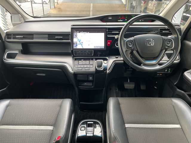ホンダ ステップワゴン スパーダ eHEV G EXホンダS 広島県 2021(令3)年 6.3万km プレミアムスパークルブラックパール 禁煙/ホンダセンシング/・衝突軽減ブレーキ〈CMBS〉/・誤発進抑制機能/・歩行者事故低減ステアリング/・外逸脱抑制機能/・渋滞追従機能付アダプティブ・クルーズ・コントロール/・LKAS〈車線維持支援システム〉/・先行車発進お知らせ機能/・標識認識機能/純正10型ナビ/・CD/DVD/Bluetooth/フルセグTV/ApplecarPlay/バックカメラ/両側パワースライドドア/わくわくゲート/革巻きステアリング/ステアリングスイッチ/オートライト/LEDヘッドライト/フォグランプ/ハーフレザーシート/シートヒーター/コンフォートビューパッケージ/電動パーキングブレーキ/オートブレーキホールド/純正フロアマット/ドアバイザー/ビルトインETC2.0/W+サイド+カーテンエアバック