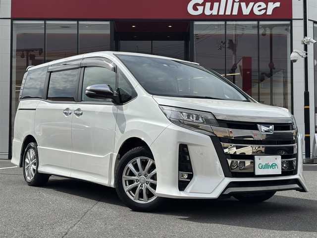 トヨタ ノア ハイブリッド Si ダブルバイビーⅢ 宮城県 2021(令3)年 7.6万km ホワイトパールクリスタルシャイン 登録時走行距離75115km/純正SDナビ/フルセグTV/CD/DVD/Bluetooth/バックカメラ/クルーズコントロール/ドライブレコーダー/衝突軽減ブレーキ/両側パワースライド/スマートキー/プッシュスタート/オートライト/シートヒーター/電動格納ミラー/LEDフォグランプ/ETC