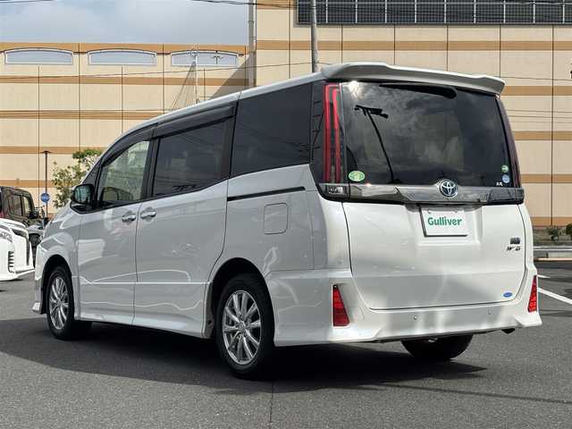 トヨタ ノア ハイブリッド Si ダブルバイビーⅢ 宮城県 2021(令3)年 7.6万km ホワイトパールクリスタルシャイン 登録時走行距離75115km/純正SDナビ/フルセグTV/CD/DVD/Bluetooth/バックカメラ/クルーズコントロール/ドライブレコーダー/衝突軽減ブレーキ/両側パワースライド/スマートキー/プッシュスタート/オートライト/シートヒーター/電動格納ミラー/LEDフォグランプ/ETC