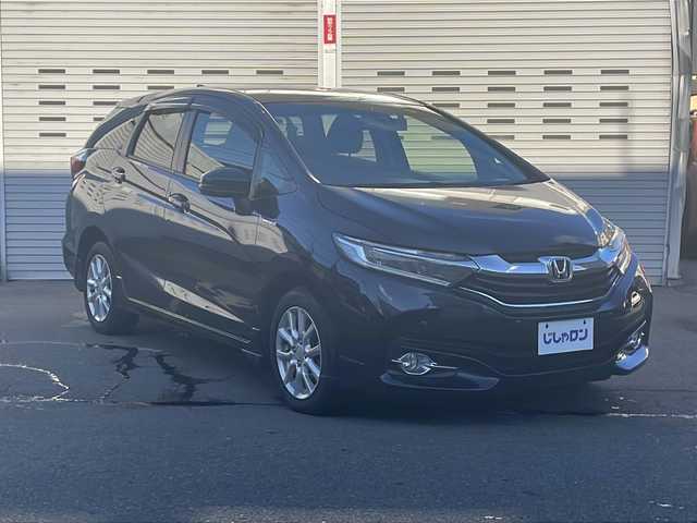 ホンダ シャトル ハイブリッド X 道央・札幌 2016(平28)年 8.2万km ミッドナイトブルービームM (株)IDOMが運営する【じしゃロン札幌店】の自社ローン専用車両になります。こちらは現金またはオートローンご利用価格です。自社ローンご希望の方は別途その旨お申し付けください。/・純正メモリーナビ/・Bluetooth/・ワンセグTV/・ビルトインETC/・バックカメラ/・社外前後ドライブレコーダー/・LEDヘッドライト/・フルフラットシート/・サイドエアバック/・4WD/・ハイブリッド