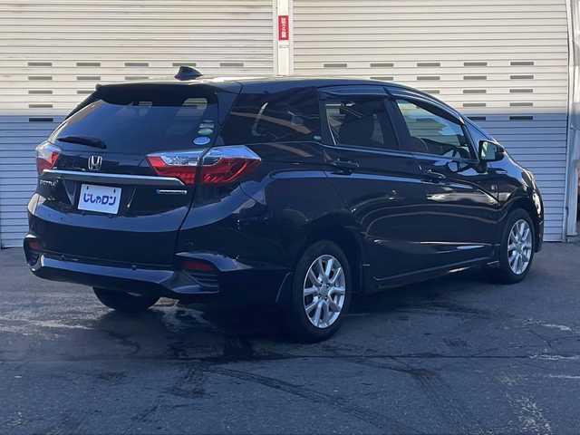 ホンダ シャトル ハイブリッド X 道央・札幌 2016(平28)年 8.2万km ミッドナイトブルービームM (株)IDOMが運営する【じしゃロン札幌店】の自社ローン専用車両になります。こちらは現金またはオートローンご利用価格です。自社ローンご希望の方は別途その旨お申し付けください。/・純正メモリーナビ/・Bluetooth/・ワンセグTV/・ビルトインETC/・バックカメラ/・社外前後ドライブレコーダー/・LEDヘッドライト/・フルフラットシート/・サイドエアバック/・4WD/・ハイブリッド