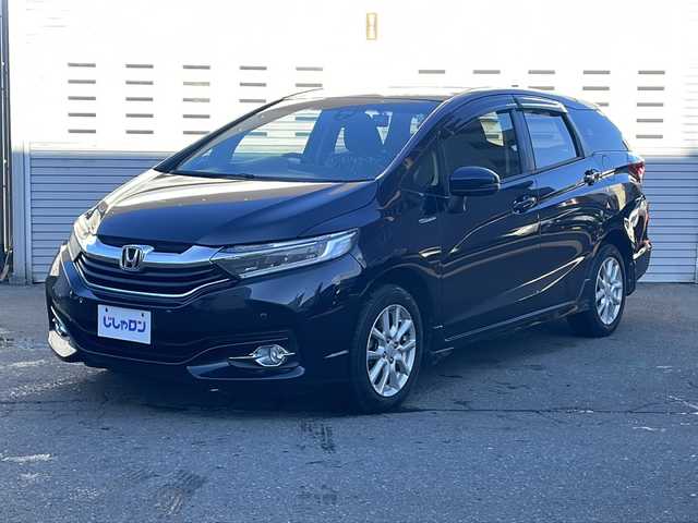 ホンダ シャトル ハイブリッド X 道央・札幌 2016(平28)年 8.2万km ミッドナイトブルービームM (株)IDOMが運営する【じしゃロン札幌店】の自社ローン専用車両になります。こちらは現金またはオートローンご利用価格です。自社ローンご希望の方は別途その旨お申し付けください。/・純正メモリーナビ/・Bluetooth/・ワンセグTV/・ビルトインETC/・バックカメラ/・社外前後ドライブレコーダー/・LEDヘッドライト/・フルフラットシート/・サイドエアバック/・4WD/・ハイブリッド