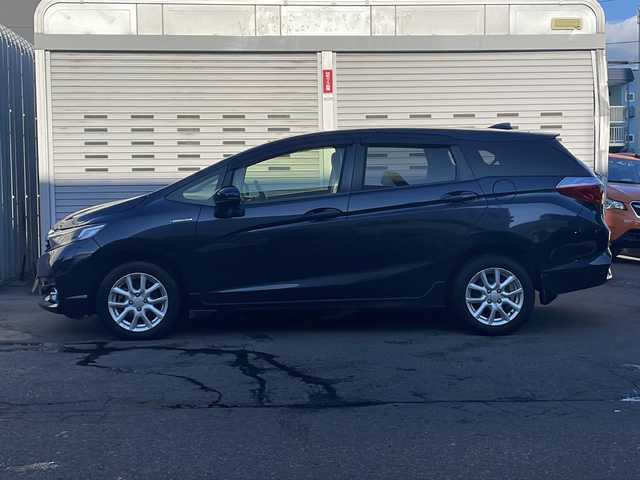 ホンダ シャトル ハイブリッド X 道央・札幌 2016(平28)年 8.2万km ミッドナイトブルービームM (株)IDOMが運営する【じしゃロン札幌店】の自社ローン専用車両になります。こちらは現金またはオートローンご利用価格です。自社ローンご希望の方は別途その旨お申し付けください。/・純正メモリーナビ/・Bluetooth/・ワンセグTV/・ビルトインETC/・バックカメラ/・社外前後ドライブレコーダー/・LEDヘッドライト/・フルフラットシート/・サイドエアバック/・4WD/・ハイブリッド