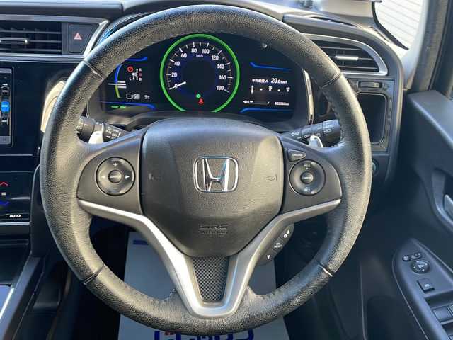 ホンダ シャトル ハイブリッド X 道央・札幌 2016(平28)年 8.2万km ミッドナイトブルービームM (株)IDOMが運営する【じしゃロン札幌店】の自社ローン専用車両になります。こちらは現金またはオートローンご利用価格です。自社ローンご希望の方は別途その旨お申し付けください。/・純正メモリーナビ/・Bluetooth/・ワンセグTV/・ビルトインETC/・バックカメラ/・社外前後ドライブレコーダー/・LEDヘッドライト/・フルフラットシート/・サイドエアバック/・4WD/・ハイブリッド