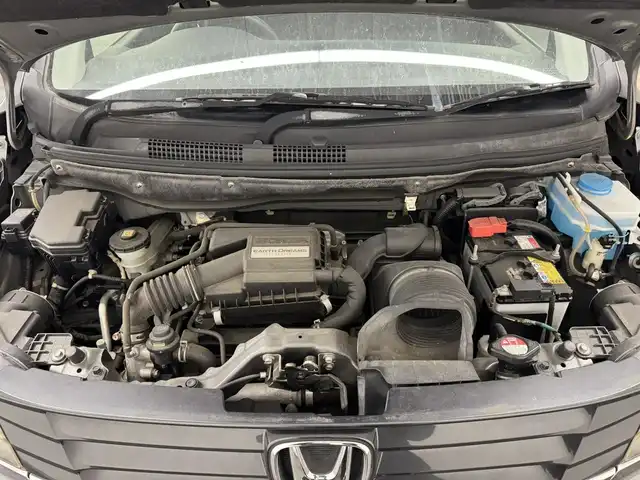 ホンダ Ｎ ＷＧＮ カスタム G ターボパッケージ 三重県 2014(平26)年 1.3万km ポリッシュドメタルメタリック ガソリン・ターボ/FF/MTモード付インパネCVT/純正 7インチナビ VXM-145C/（FM/AM/CD/USB/iPod/SD/VTR/AUX）/バックカメラ/安全/・近距離衝突軽減ブレーキ［CTBA］/・VSA（ABS＋TCS＋横すべり抑制）/・SRS サイド＆カーテンエアバッグ/装備/・ハーフレザーシート/・クルーズコントロール/・パドルシフト/・オートエアコン/・オートライト/・キセノンヘッドライト/・フロントフォグランプ/・ステアリングスイッチ/・電動格納ドアミラー（ウインカー付）/・純正14inAW/・プッシュスタート/・スマートキーx2/・本革巻きステアリング/・リアシートベルトインジケータ付きインナーミラー/など