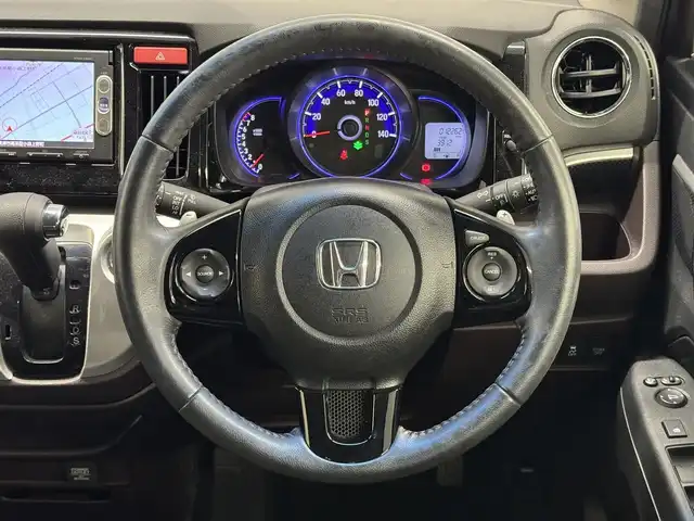 ホンダ Ｎ ＷＧＮ カスタム G ターボパッケージ 三重県 2014(平26)年 1.3万km ポリッシュドメタルメタリック ガソリン・ターボ/FF/MTモード付インパネCVT/純正 7インチナビ VXM-145C/（FM/AM/CD/USB/iPod/SD/VTR/AUX）/バックカメラ/安全/・近距離衝突軽減ブレーキ［CTBA］/・VSA（ABS＋TCS＋横すべり抑制）/・SRS サイド＆カーテンエアバッグ/装備/・ハーフレザーシート/・クルーズコントロール/・パドルシフト/・オートエアコン/・オートライト/・キセノンヘッドライト/・フロントフォグランプ/・ステアリングスイッチ/・電動格納ドアミラー（ウインカー付）/・純正14inAW/・プッシュスタート/・スマートキーx2/・本革巻きステアリング/・リアシートベルトインジケータ付きインナーミラー/など