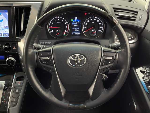 トヨタ ヴェルファイア Z Gエディション 宮崎県 2015(平27)年 6.2万km ホワイトパールクリスタルシャイン 禁煙車/プリクラッシュセーフティシステム/純正10.5型ディスプレイオーディオ/（AUX/HDMI/Bluetooth/FMAM/フルセグTV/ナビ）/純正13.3型リアフリップダウンモニター/純正JBLサウンドシステム/純正ビルトインDSRC ETC/純正キセノンオートライト/純正フォグ/純正18インチアルミ/純正フロアマット/アダプティブクルーズコントロール/黒本革シート/前席パワーシート/シートヒーター/エグゼクティブパワーシート/ウッドコンビ本革巻ハンドル/マホガニーウッドパネル/パワーバックドア/スマートキー/プッシュエンジンスタート/新車時保証書/取扱い説明書